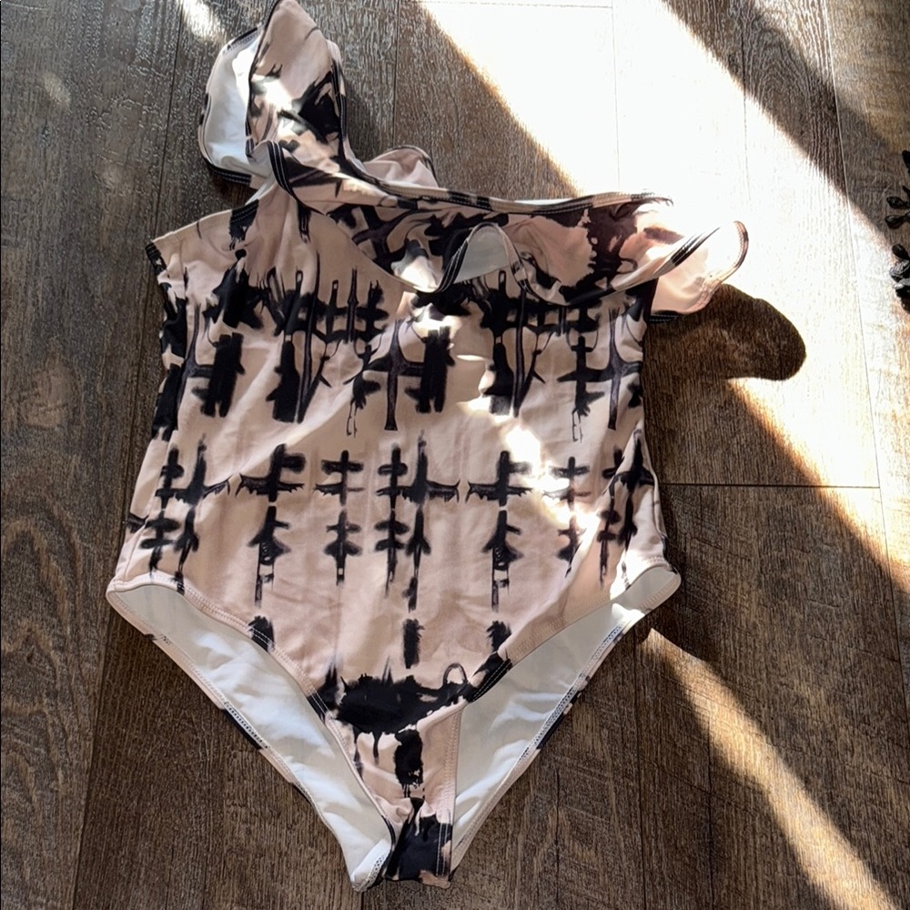 Stylish Black and Cream One-Piece Swimsuit